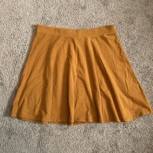 Forever 21 mustard/golden yellow/orange plain circle/skater skirt, Medium